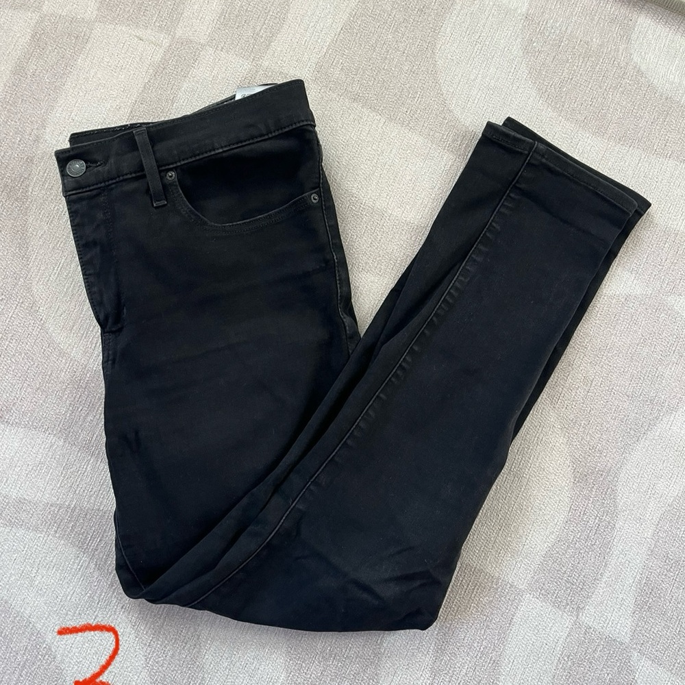 Levi’s, 311 Shaping Skinny in matte black, size 31